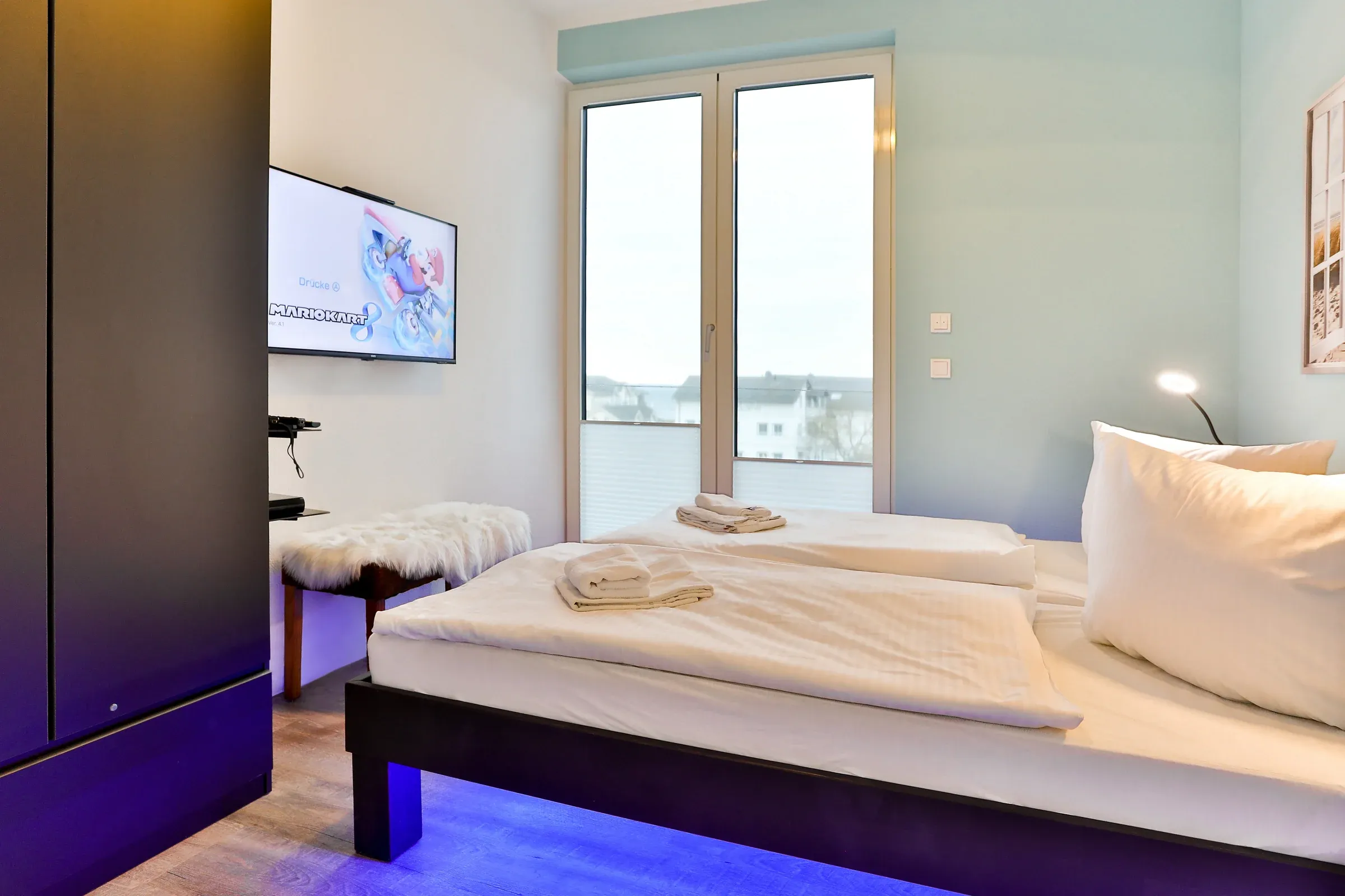Chambre avec deux lits simples
